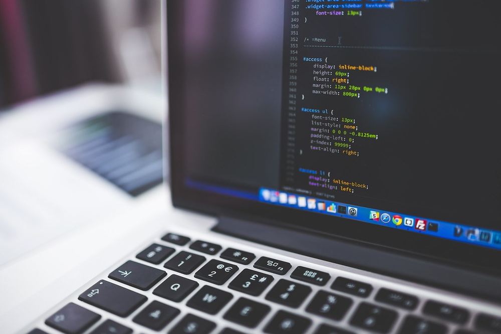 Close-up of custom software code on a laptop screen